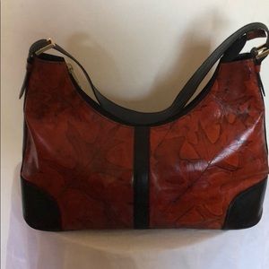 Leaf leather handbag.